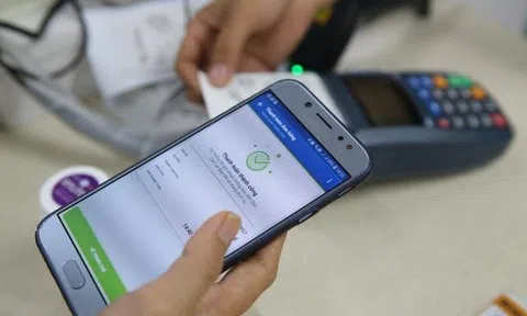 Tết năm nay, nhiều ngân hàng sẽ hết cảnh nghẽn giao dịch?